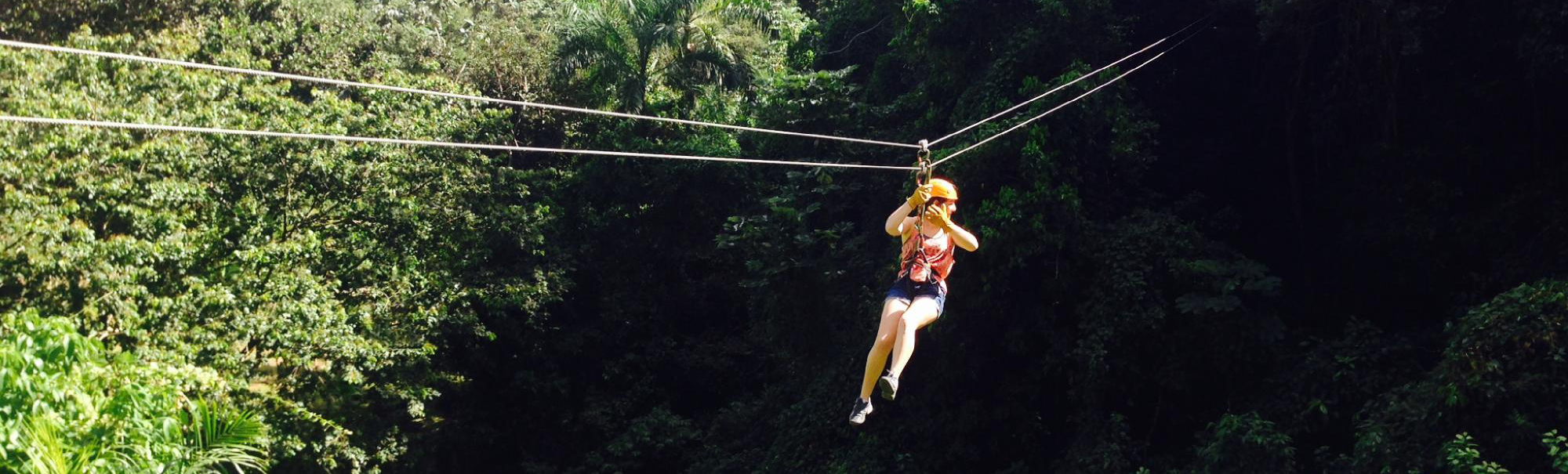 batey-zipline-adventure woman ziplining